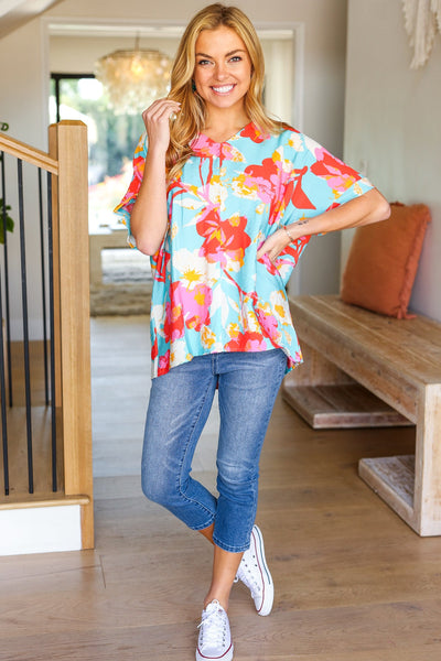 Weekend Ready Aqua & Coral Floral V Neck Woven Top